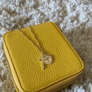 Gold cross necklace with crystal details